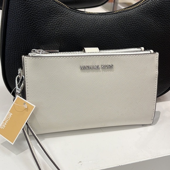 Michael Kors Handbags - Michael Kors Jet Set Travel Large Double Zip Leather Wristlet Optic White